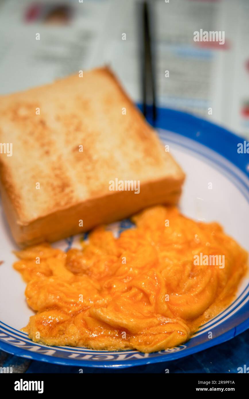 Crispy scrambled egg toast in Hong Kong tea restaurant Stock Photo - Alamy