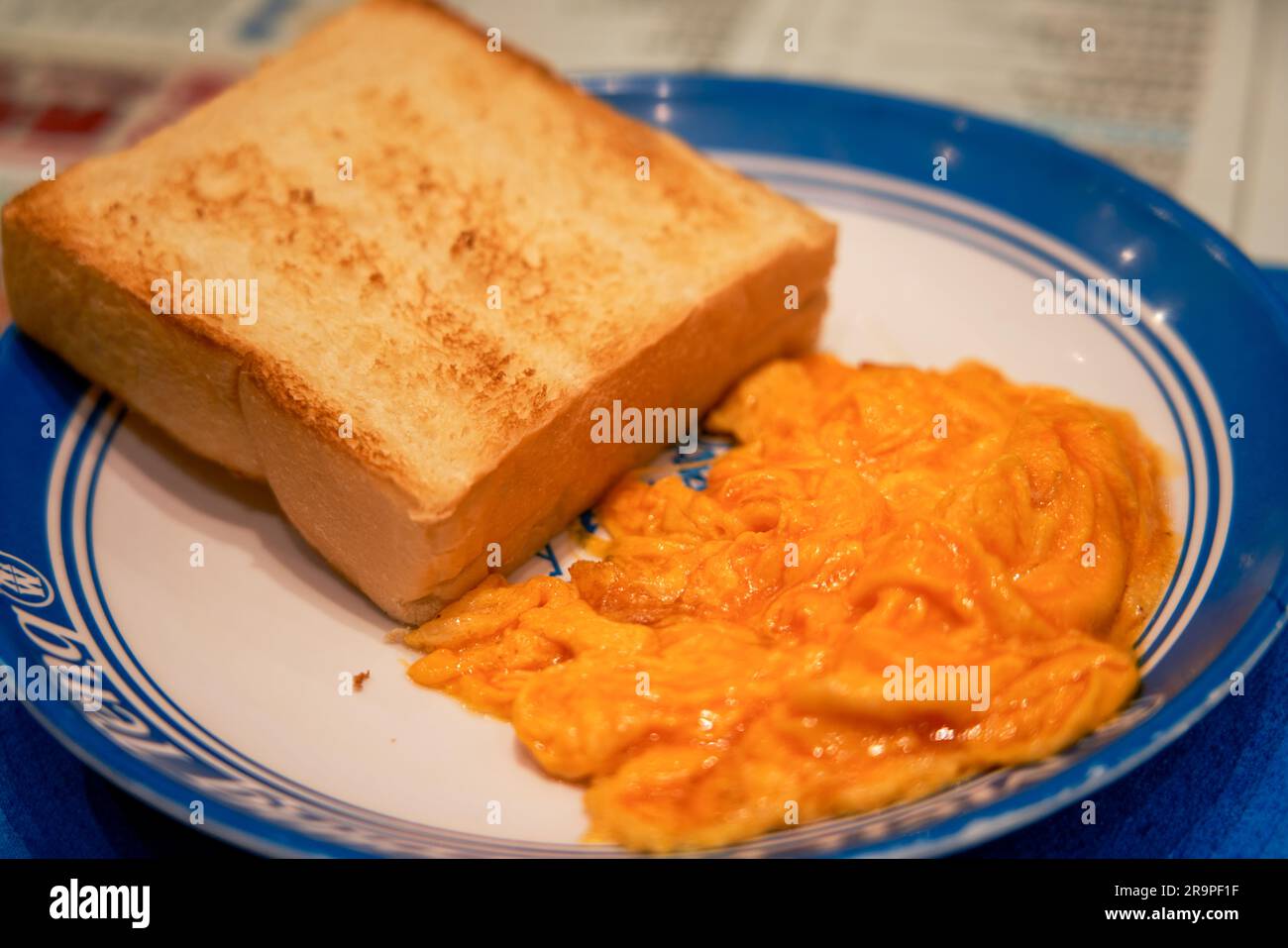 Crispy scrambled egg toast in Hong Kong tea restaurant Stock Photo - Alamy