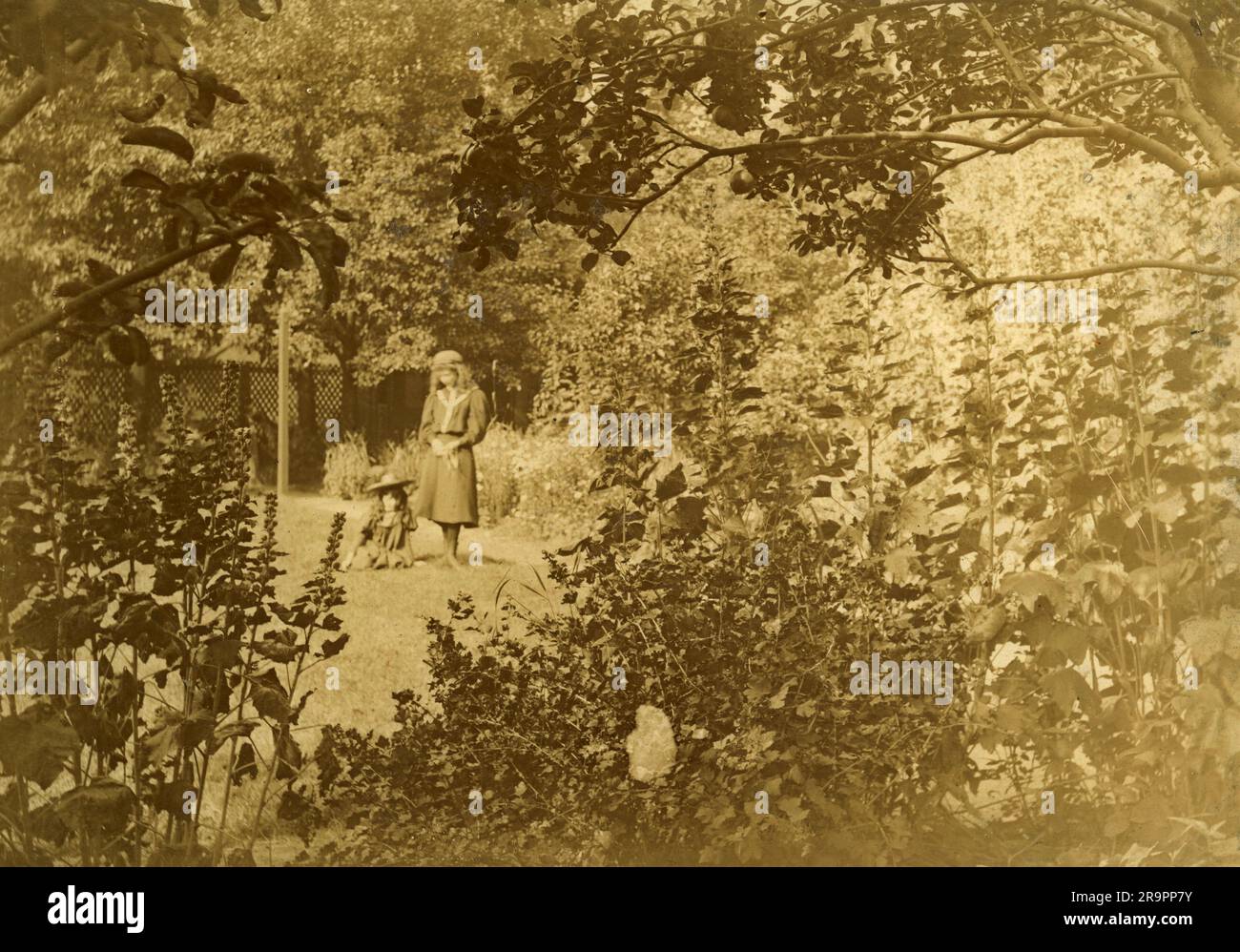 Mainly images of children in gardens. Late Victorian to Edwardian period. Stock Photo