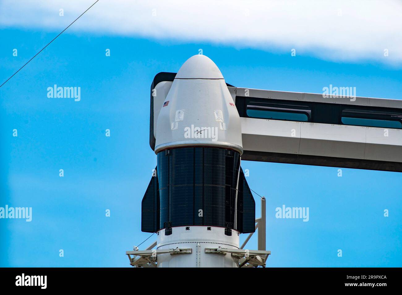 NASA SpaceX CRS-28 Vertical on SLC-39A. A close-up view of the SpaceX Dragon spacecraft atop the Falcon 9 rocket on the pad at Launch Complex 39A at NASA’s Kennedy Space Center in Florida on June 2, 2023. SpaceX is scheduled to launch its 28th commercial resupply services mission to the International Space Station for NASA. Launch is scheduled for June 3 at 12:35 p.m. EDT. Dragon will deliver approximately 7,000 pounds of crew supplies, equipment, and science experiments to the orbiting laboratory. The spacecraft is expected to spend about a month attached to the orbiting outpost before it ret Stock Photo