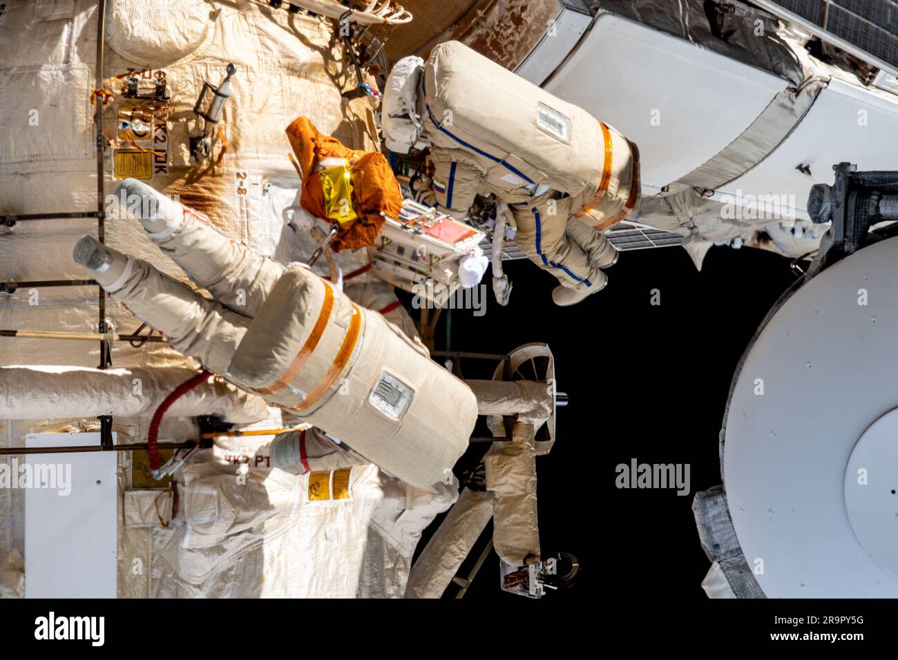Astronaut Sultan Alneyadi conducts a spacewalk outside the Russian ...