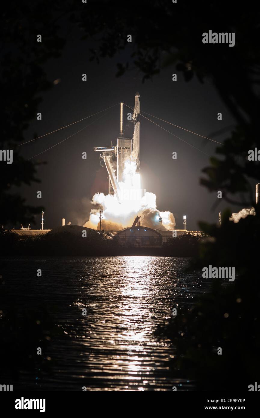 NASA/SpaceX CRS-27 Liftoff. The SpaceX Falcon 9 rocket carrying the Dragon spacecraft lifts off from Launch Complex 39A at NASA’s Kennedy Space Center in Florida on March 14, 2023, on the company’s 27th commercial resupply services mission for the agency to the International Space Station. Liftoff was at 8:30 p.m. EDT. Dragon will deliver more than 6,000 pounds of cargo, including a variety of NASA investigations, supplies, and equipment to the crew aboard the space station, including the final two experiments comprising the National Institutes for Health and International Space Station Nation Stock Photo
