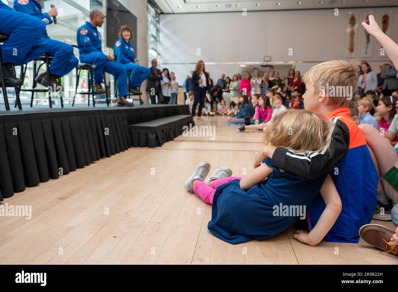 Artemis II Crew Canadian Embassy Workforce Event. Children of embassy staff are seen during an embassy workforce event with CSA (Canadian Space Agency) astronaut Jeremy Hansen, NASA astronauts Reid Wiseman, Victor Glover, and Christina Hammock Koch, Friday, May 19, 2023, at the Canadian Embassy in Washington. Wiseman, Glover, Koch, and Hansen, who will fly around the Moon on NASA’s Artemis II flight test, visited Washington to discuss their upcoming mission with members of Congress and others. Stock Photo