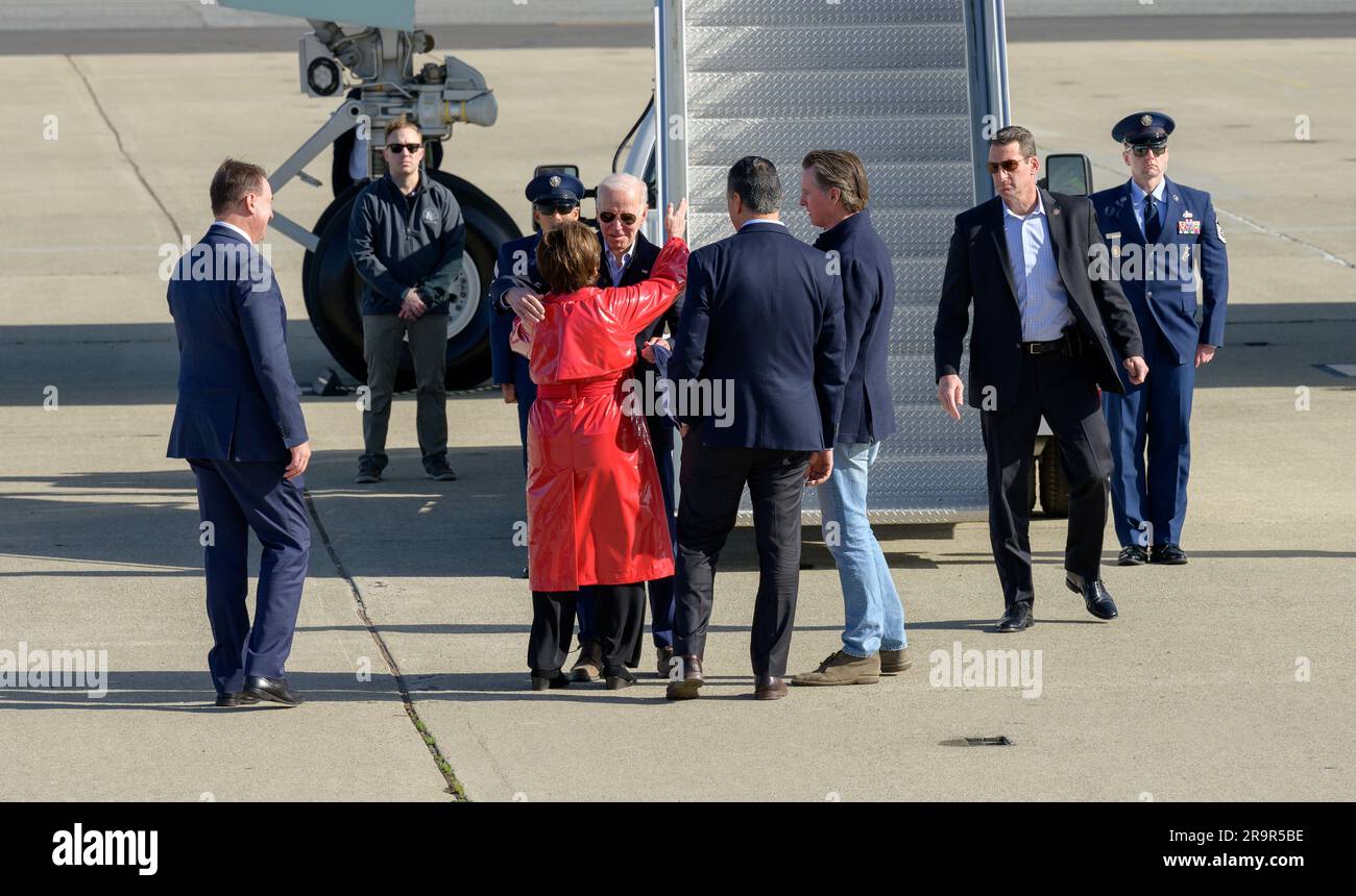 U.S. President Joe Biden Arrives Aboard Air Force One at Moffett Federal Airfield. Biden was greeted by acting deputy center director, David Korsmeyer, Congresswoman Anna Eshoo, Senator Alex Padilla, and California Governor Gavin Newsom before boarding the Marine One helicopter to view consequences of flooding and other storm impacts along California’s central coast. Stock Photo