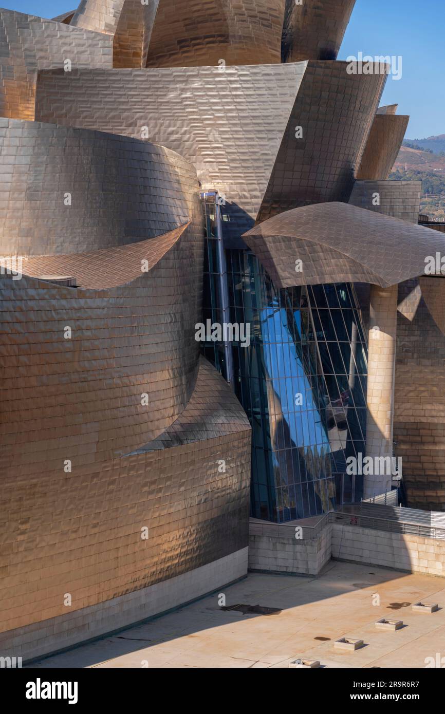 Spain, Basque Country, Bilbao, A section of the Guggenheim Museum seen from Puente de la Salve. Stock Photo