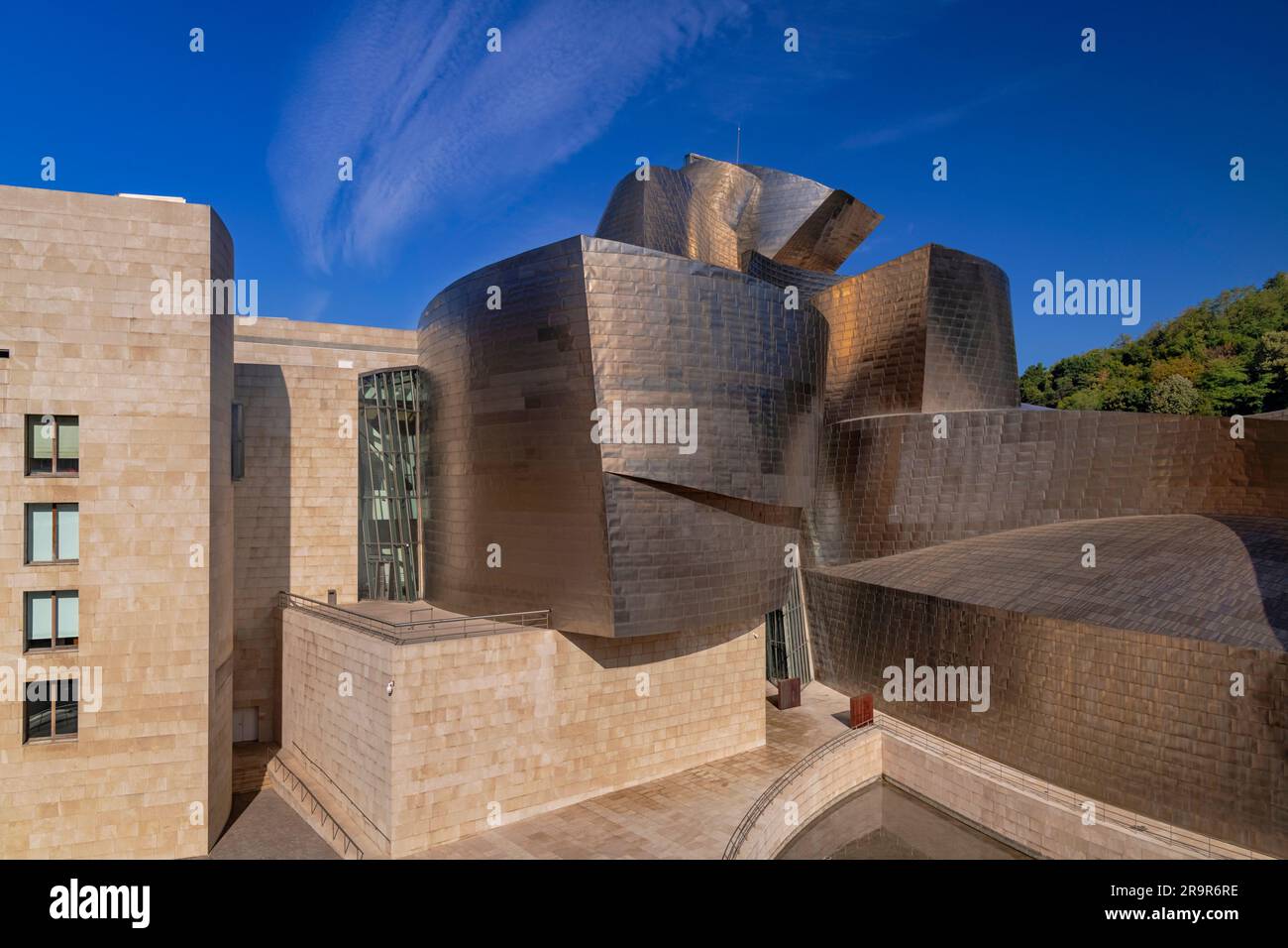 Spain, Basque Country, Bilbao, Rear of the Guggenheim Museum seen from Puente de la Salve. Stock Photo