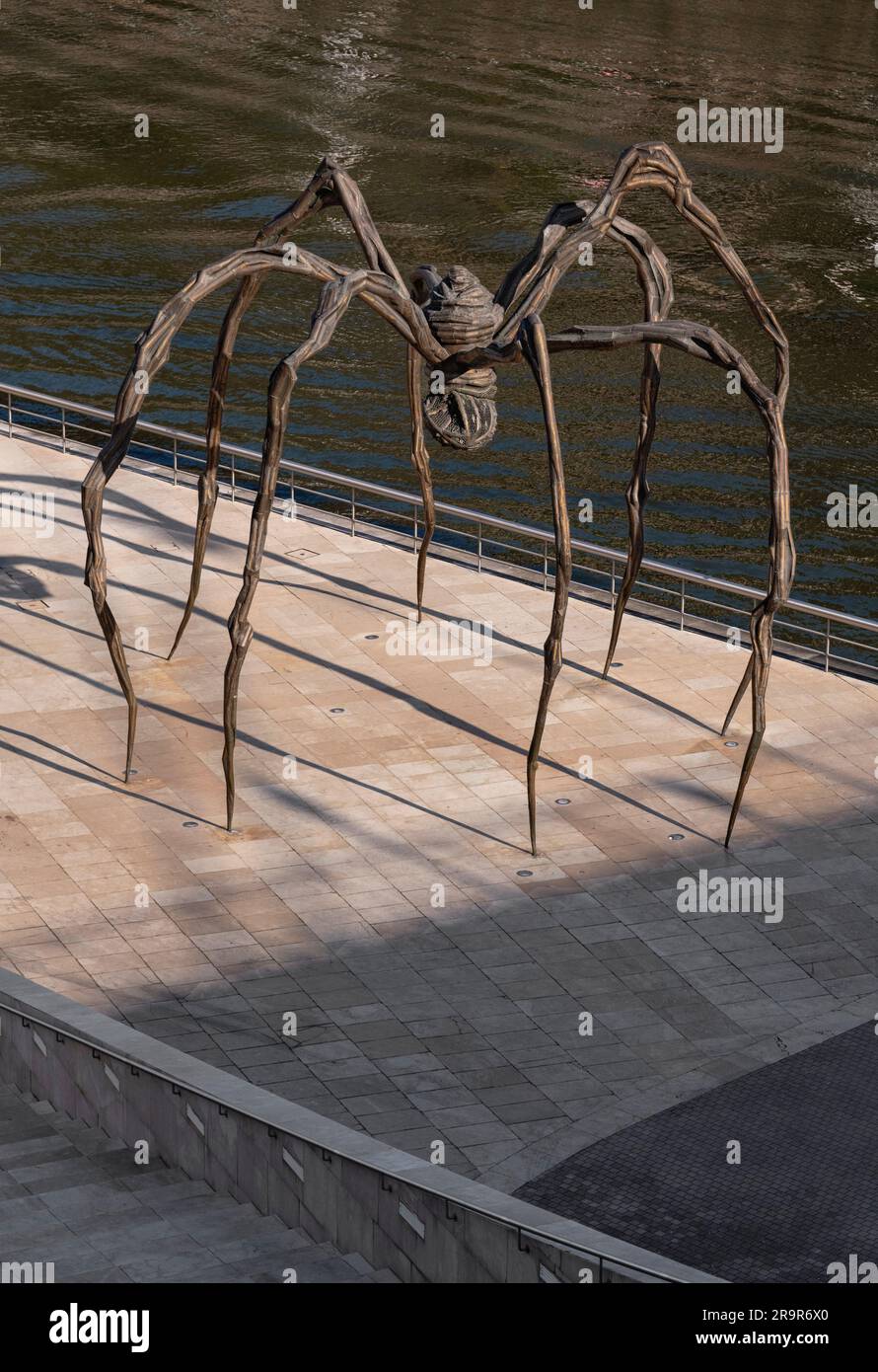 Spain, Basque Country, Bilbao, Guggenheim Museum area, Maman is a bronze, stainless steel, and marble sculpture of a spider by the artist Louise Bourg Stock Photo