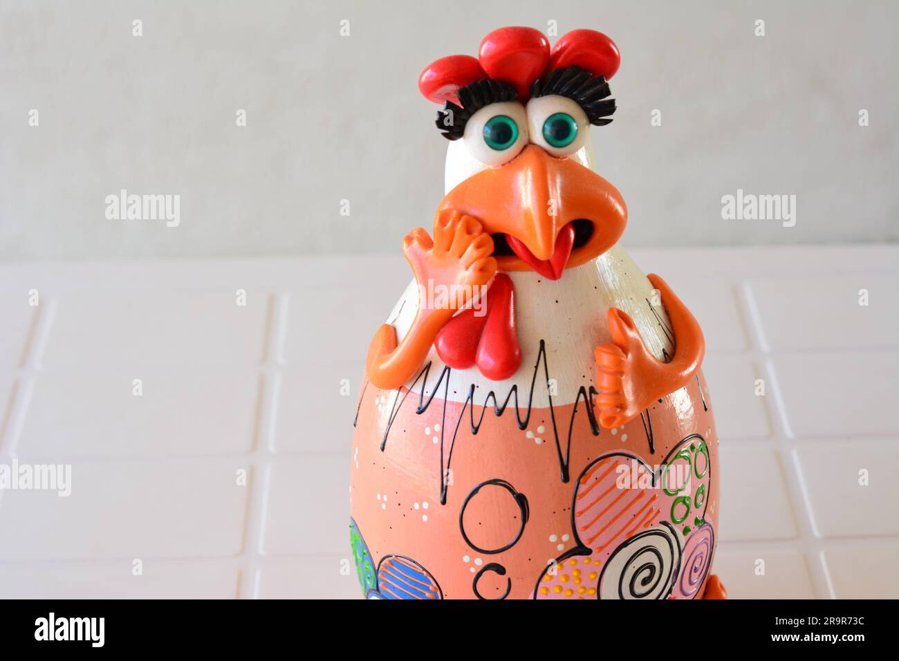 City: Marilia, São Paulo, Brazil - 07 April 2022: Craftsmanship. Ginger chicken on display of crafts made in Brazil, South America, zoom style photo, Stock Photo