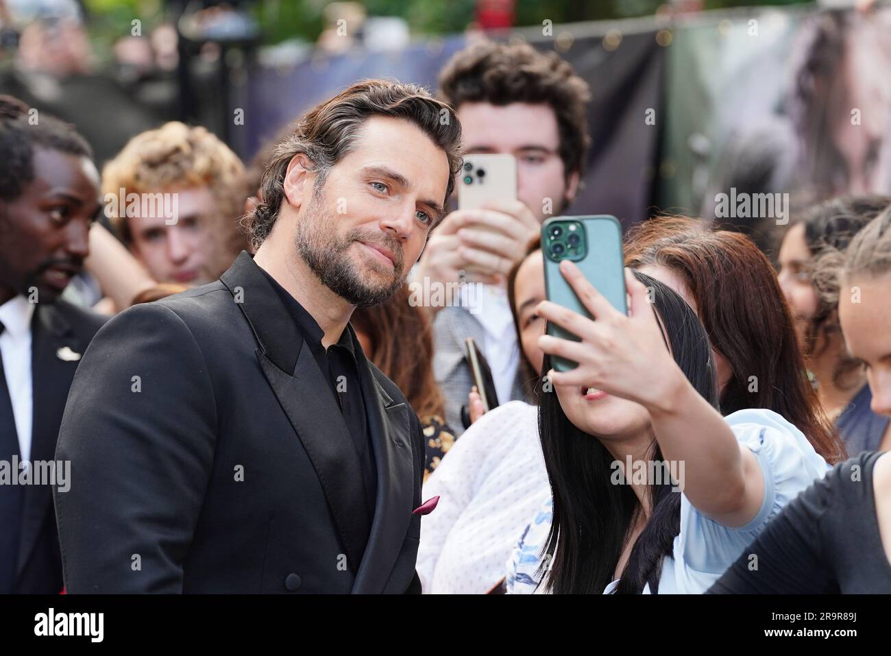 Henry Cavill Takes A Selfie With A Fan As He Attends The UK Premiere Of henry-cavill-takes-a-selfie-with-a-fan-as-he-attends-the-uk-premiere-of