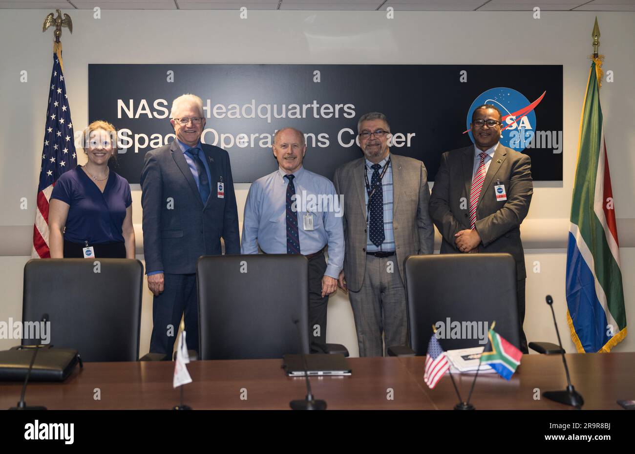 Meeting with Western Cape Government’s Alan Winde. From left to right, Provincial Minister for Finance and Economic Opportunities of the Western Cape Government, Mireille Wenger, Premier of the Western Cape Government, Alan Winde, NASA Associate Administrator for the Space Operations Mission Directorate, Ken Bowersox, NASA Deputy Associate Administrator for Space Communications and Navigation, Badri Younes, and Director-General of the Western Cape Government, Dr. Harry Malila, pose for a photo in the Space Operations Center during a meeting with NASA and Western Cape Government representatives Stock Photo