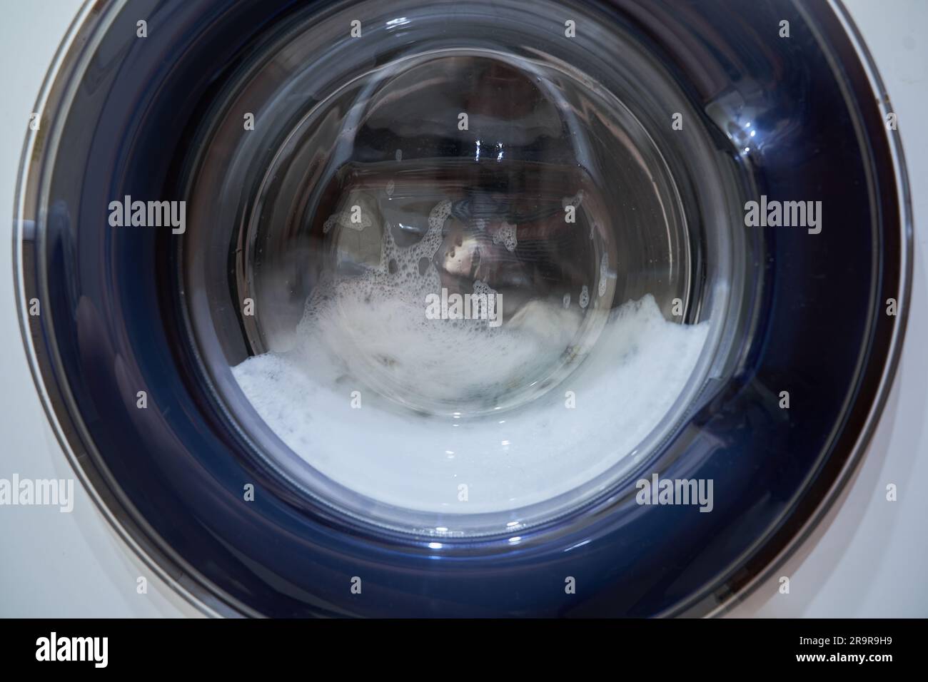 Washing in machine drum foam hi-res stock photography and images - Alamy