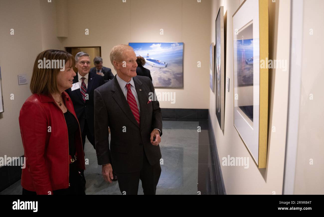 Apollo 17 50th Anniversary Celebration. Colleen Hartman, director of physics, aeronautics, and space science at the National Academies of Science , left, and NASA Administrator Bill Nelson are seen as they view the NASA Art Program Exhibition “Launching the Future: Looking Back to Look Forward” during an event celebrating the 50th anniversary of the Apollo 17 mission, Wednesday, Dec. 14, 2022, at the National Academies of Science in Washington. The three-astronaut crew of Apollo 17 - commander Eugene Cernan, lunar module pilot Harrison Schmitt, and command module pilot Ronald Evans, embarked o Stock Photo