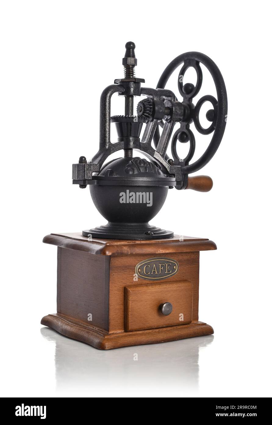 Photo of an manual antique coffee grinder isolated on a white background Stock Photo Alamy