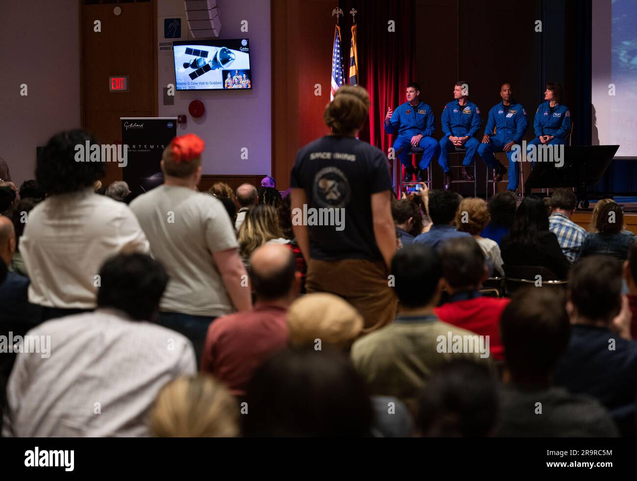 Artemis II Crew at GSFC. CSA (Canadian Space Agency) astronaut Jeremy Hansen, left, answers a question alongside NASA astronauts Reid Wiseman second from left, Victor Glover, and Christina Hammock Koch, during an employee engagement event, Friday, May 19, 2023, at NASA’s Goddard Space Flight Center in Greenbelt, Md. Wiseman, Glover, Hammock Koch, and Hansen, who will fly around the Moon on NASA’s Artemis II flight test, visited Washington to discuss their upcoming mission with members of Congress and others. Stock Photo