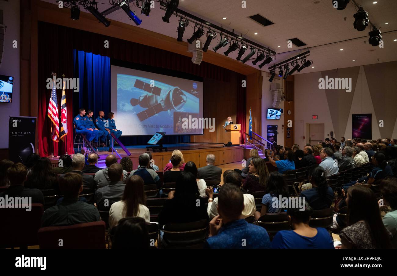 Artemis II Crew at GSFC. CSA (Canadian Space Agency) astronaut Jeremy Hansen, left, and NASA astronauts Reid Wiseman, Victor Glover, and Christina Hammock Koch, are seen as they are introduced by Dr. Christa Peters-Lidard, director of the Sciences and Exploration Directorate at NASA's Goddard Space Flight Center, right, during an employee engagement event, Friday, May 19, 2023, during an employee engagement event at NASA’s Goddard Space Flight Center in Greenbelt, Md. Wiseman, Glover, Hammock Koch, and Hansen, who will fly around the Moon on NASA’s Artemis II flight test, visited Washington to Stock Photo