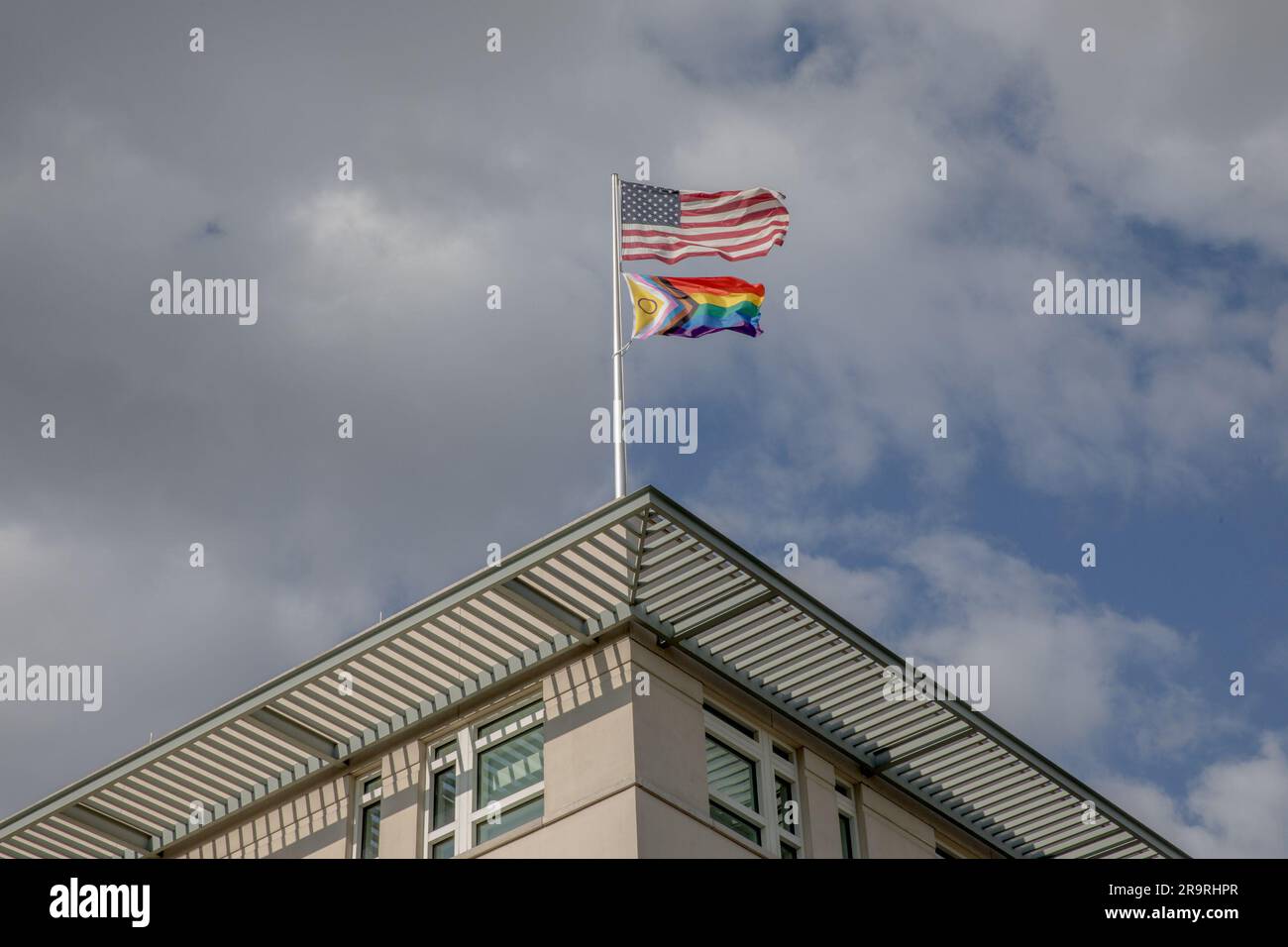 A symbol of unity and inclusiveness adorns the front of the US Embassy ...