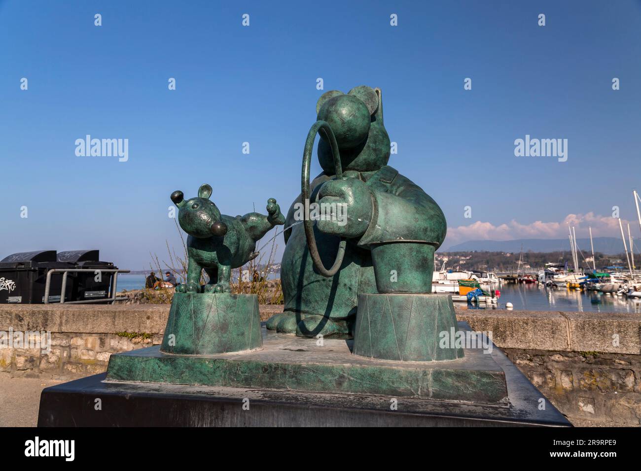 Geneva, Switzerland - 25 March 2022: Exhibition of sculptures Le Chat, created by the Belgian cartoon artist Philippe Geluck, along the Leman lakeside Stock Photo