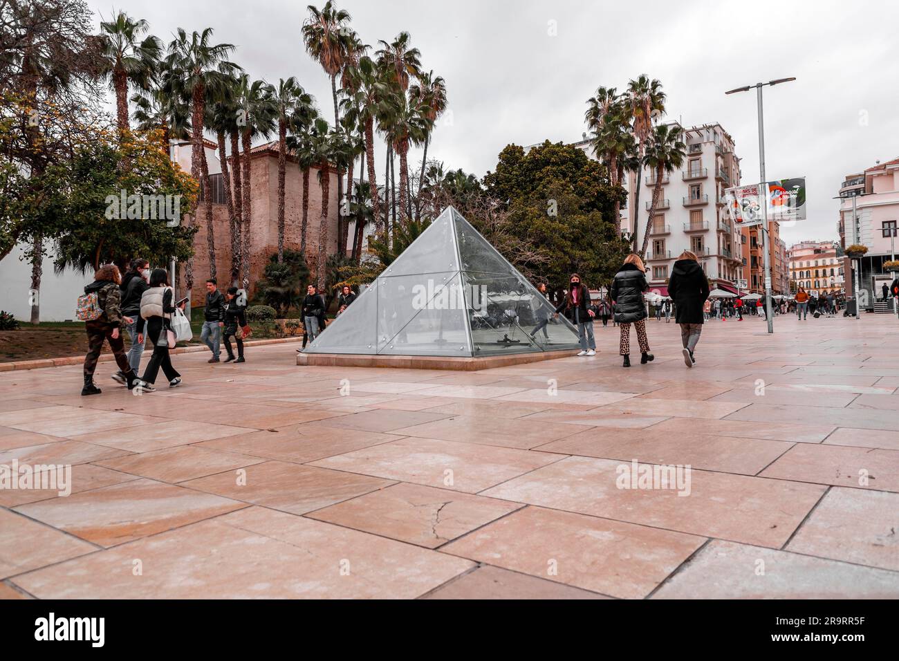 Malaga, Spain - FEB 27, 2022: The Glass Pyramid at the Calle Alcazabilla, a street in the central district of Malaga. Stock Photo