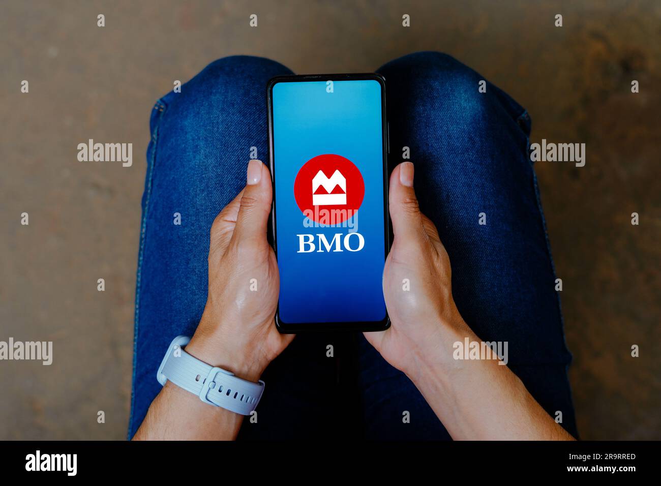In this photo illustration, the BMO Harris Bank logo is displayed on a