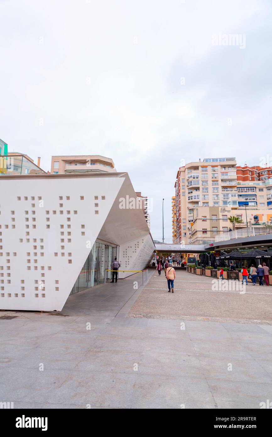 Malaga, Spain - FEB 27, 2022: Muelle Uno is an open-air complex with a variety of contemporary shops and restaurants along a waterfront promenade. Stock Photo