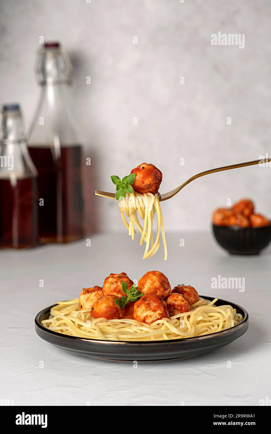 Food photography of meatball, chicken, beef; meat, spaghetti, pasta, tomato, sauce, basil, veal