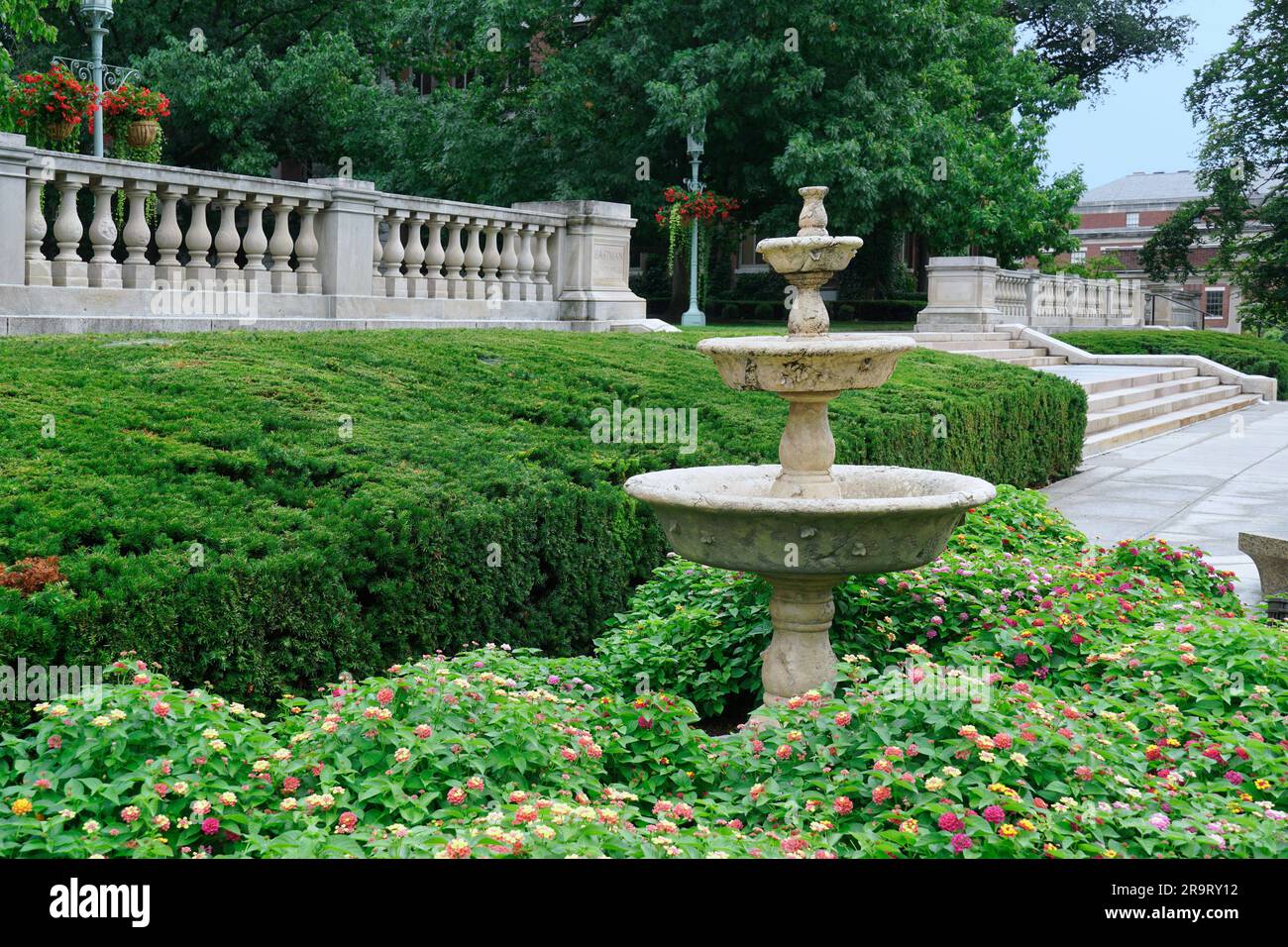 Old stone bird bath and stone balustrade at the University of Rochester Stock Photo