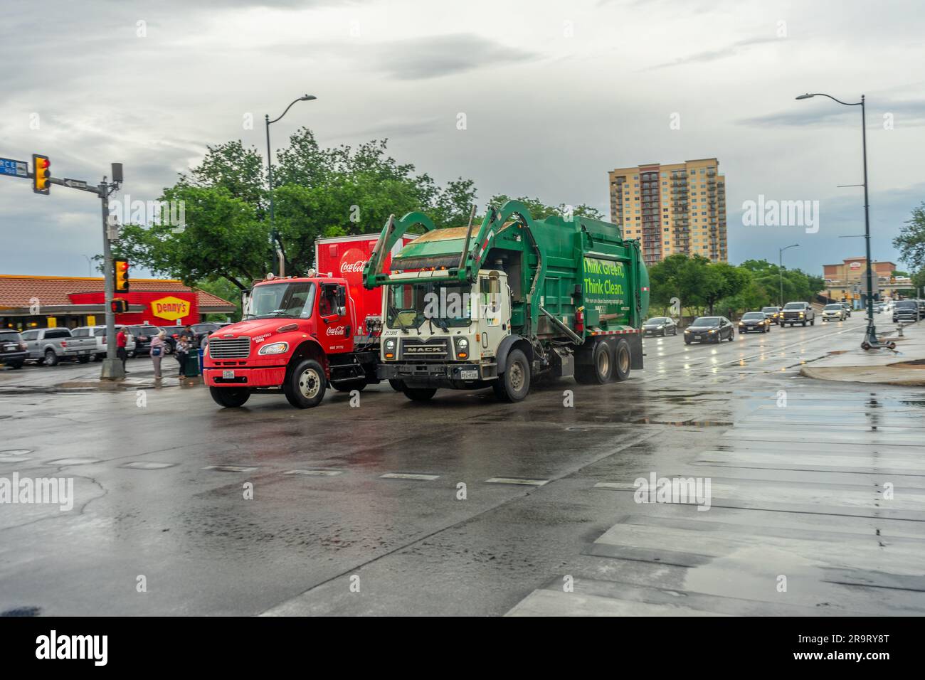 San Antonio, Texas, USA May 9, 2023 Two commercial trucks on a city street in San Antonio