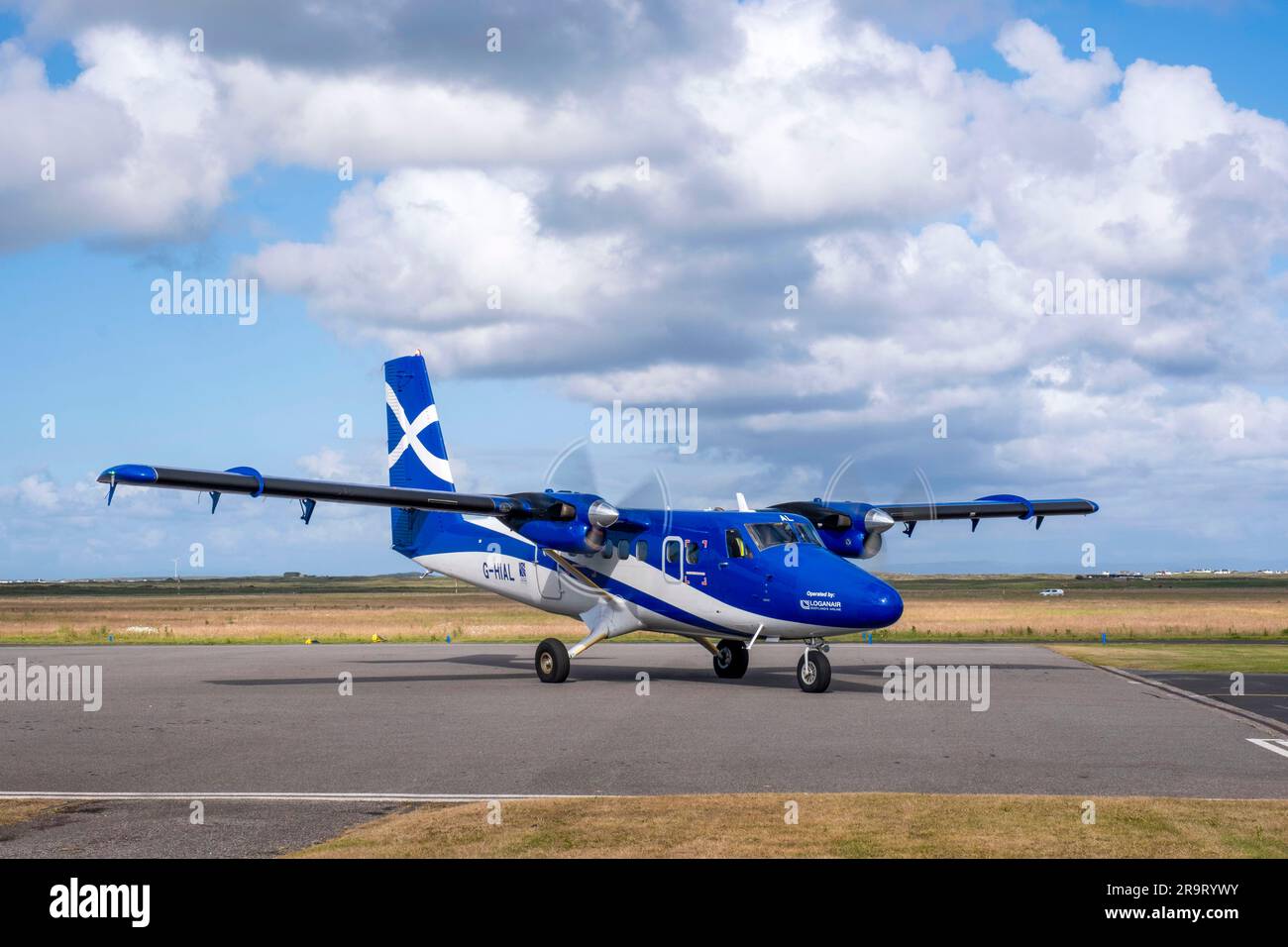 G-Hail Loganair Viking DHC-6-400 Twin Otter aircraft prepares to take off from Tiree Airport, Isle of Tiree, Inner Hebrides, Scotland UK. Stock Photo