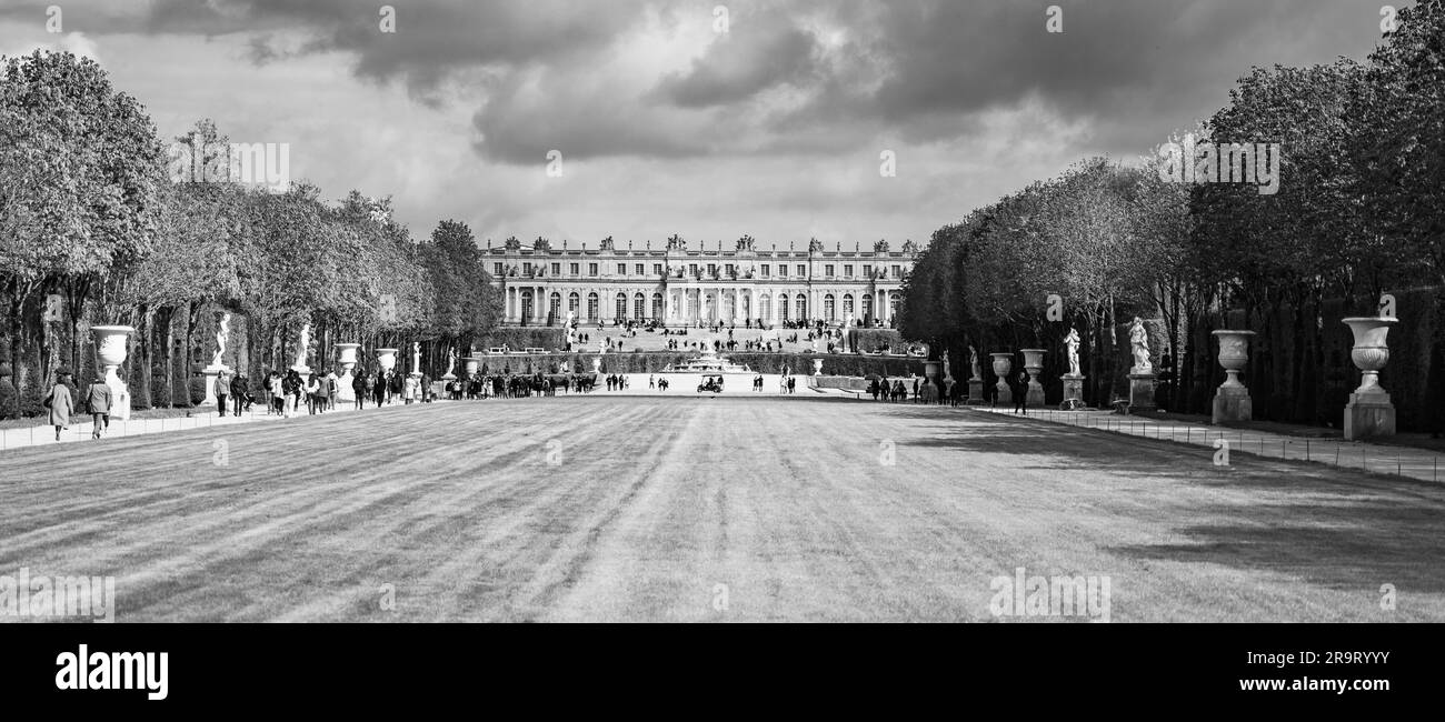 VERSAILLES, FRANCE - APRIL 15, 2023: Green Carpet and Latona Fountain in the Gardens of Versailles, Chateau Versailles near Paris, France. Black and white image. Stock Photo