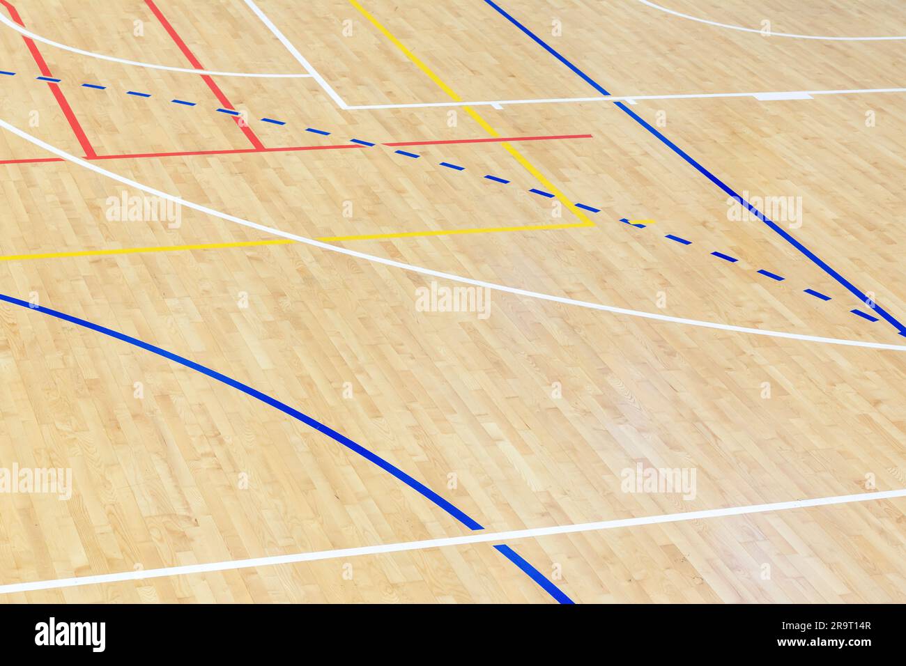 Wooden floor basketball, badminton, futsal, handball, volleyball, football, soccer court. Wooden floor of sports hall with marking lines on wooden flo Stock Photo