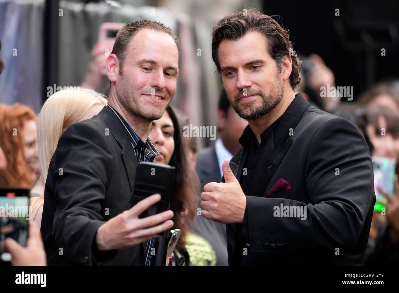 Henry Cavill Poses For A Selfie Photograph At The World Premiere For henry-cavill-poses-for-a-selfie-photograph-at-the-world-premiere-for