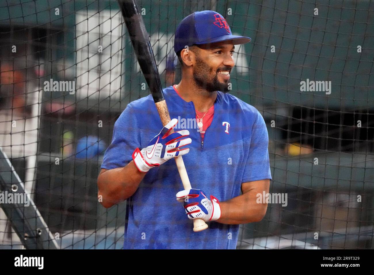 Texas Rangers' Marcus Semien takes batting practice before a