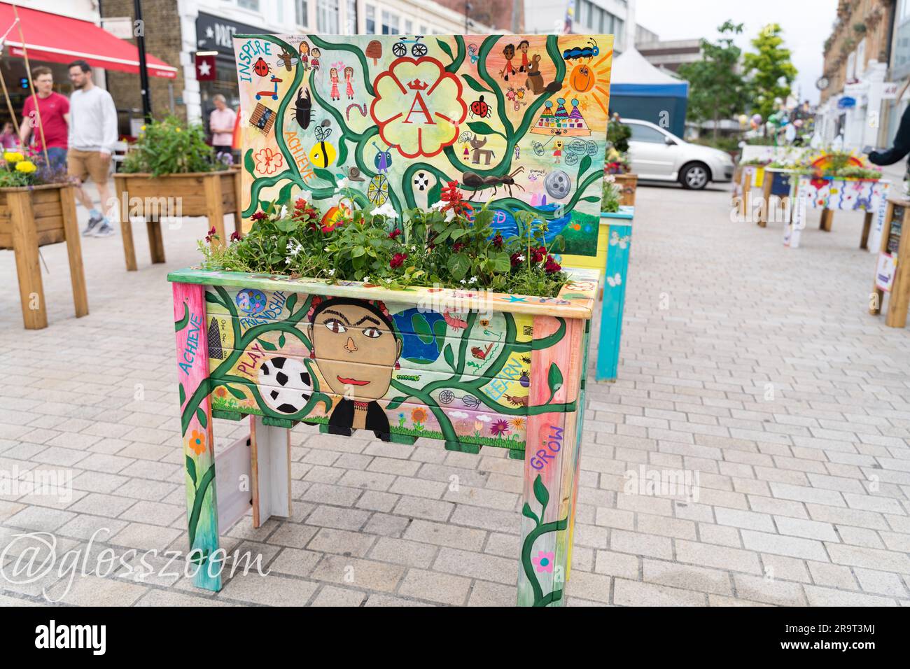 Bromley London UK. 28th June 2023. Bromley Floral Fest competition 2023 is well underway at Bromley Hight Street. Parents and school children visist their school's floral display created in garden planter, which are all open to public vote to  pick a winner.Credit:   Xiu Bao/Alamy Live News Stock Photo