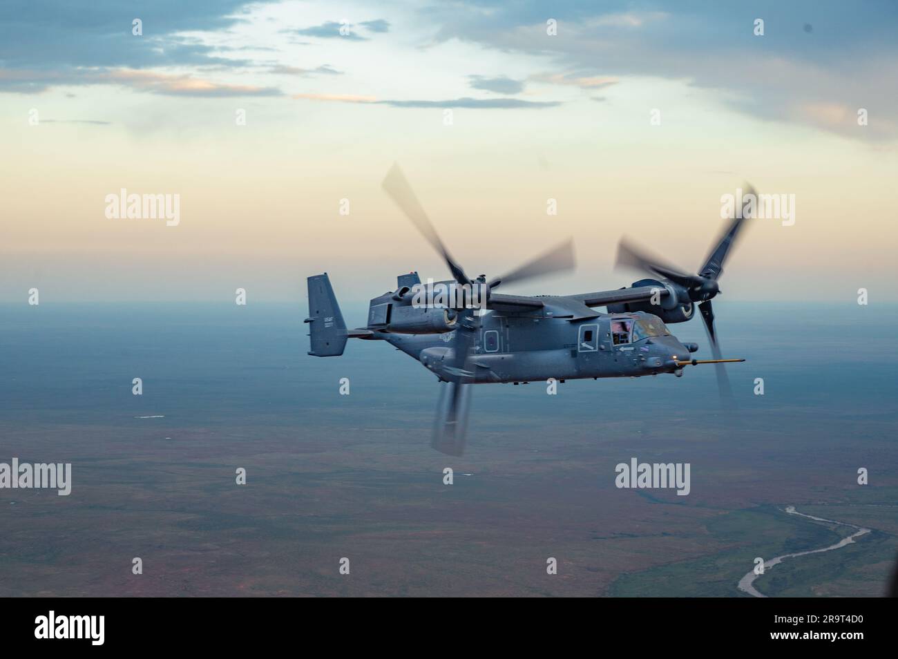 A U.S. Air Force CV-22 Osprey aircraft assigned to the 20th Operations Squadron flies during Operation Centennial Contact over New Mexico, June 27, 2023. Units across the USAF trained to ensure a collective ability to deter aggression and meet shared challenges, anytime, anywhere. (U.S. Air Force photo by Senior Airman Alexcia Givens) Stock Photo