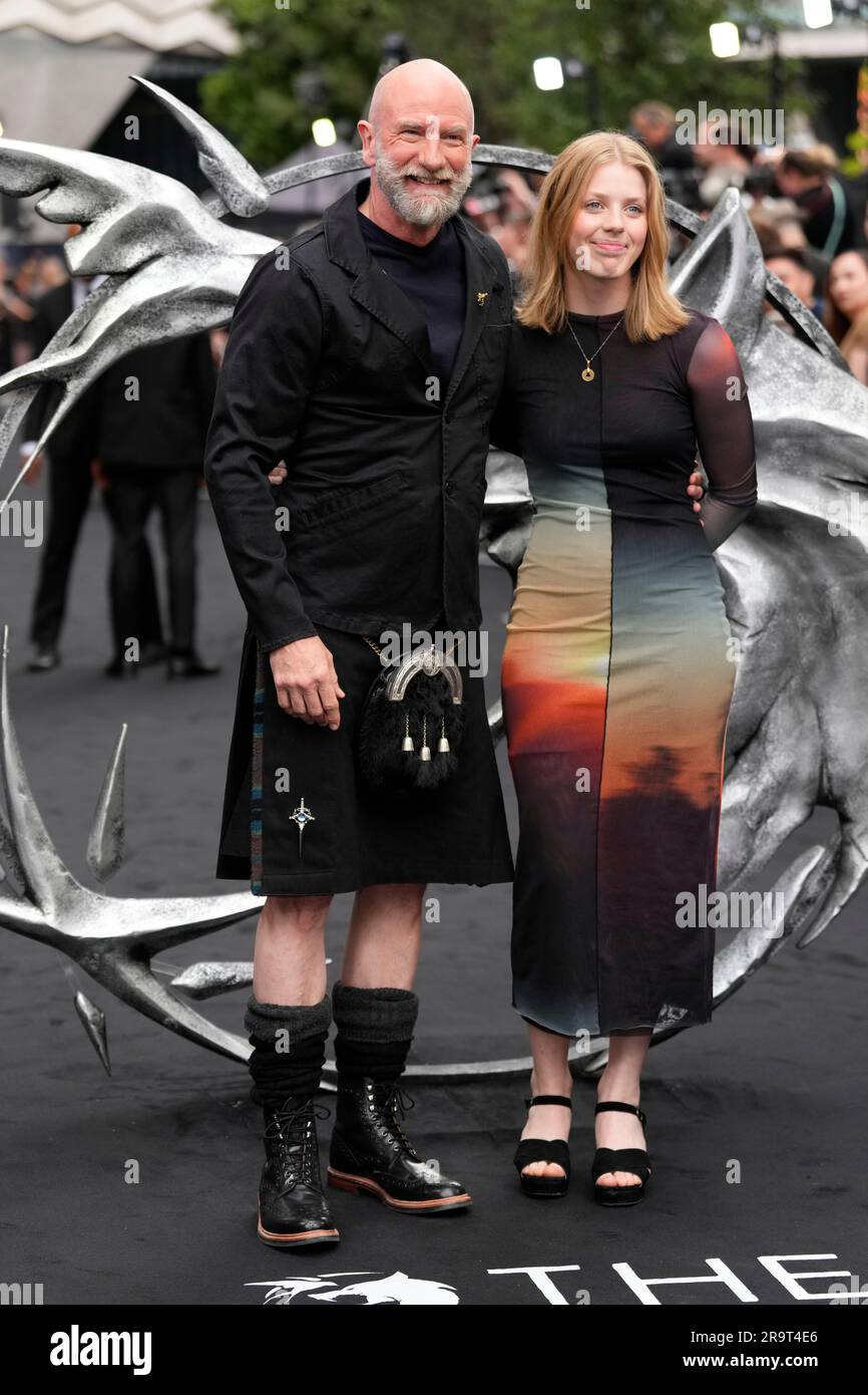Graham McTavish, left, and daughter pose for photographers upon arrival