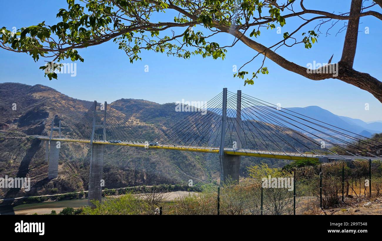 Acapulco, Guerrero, Mexico - Apr 28 2023: The Mezcala Solidaridad Bridge is a cable-stayed bridge over the Balsas River on the Autopista del Sol Stock Photo