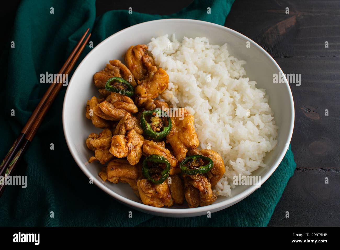 Crispy Hawaiian Garlic Chicken Served with Jasmine Rice Fried chicken thighs in garlicsoy