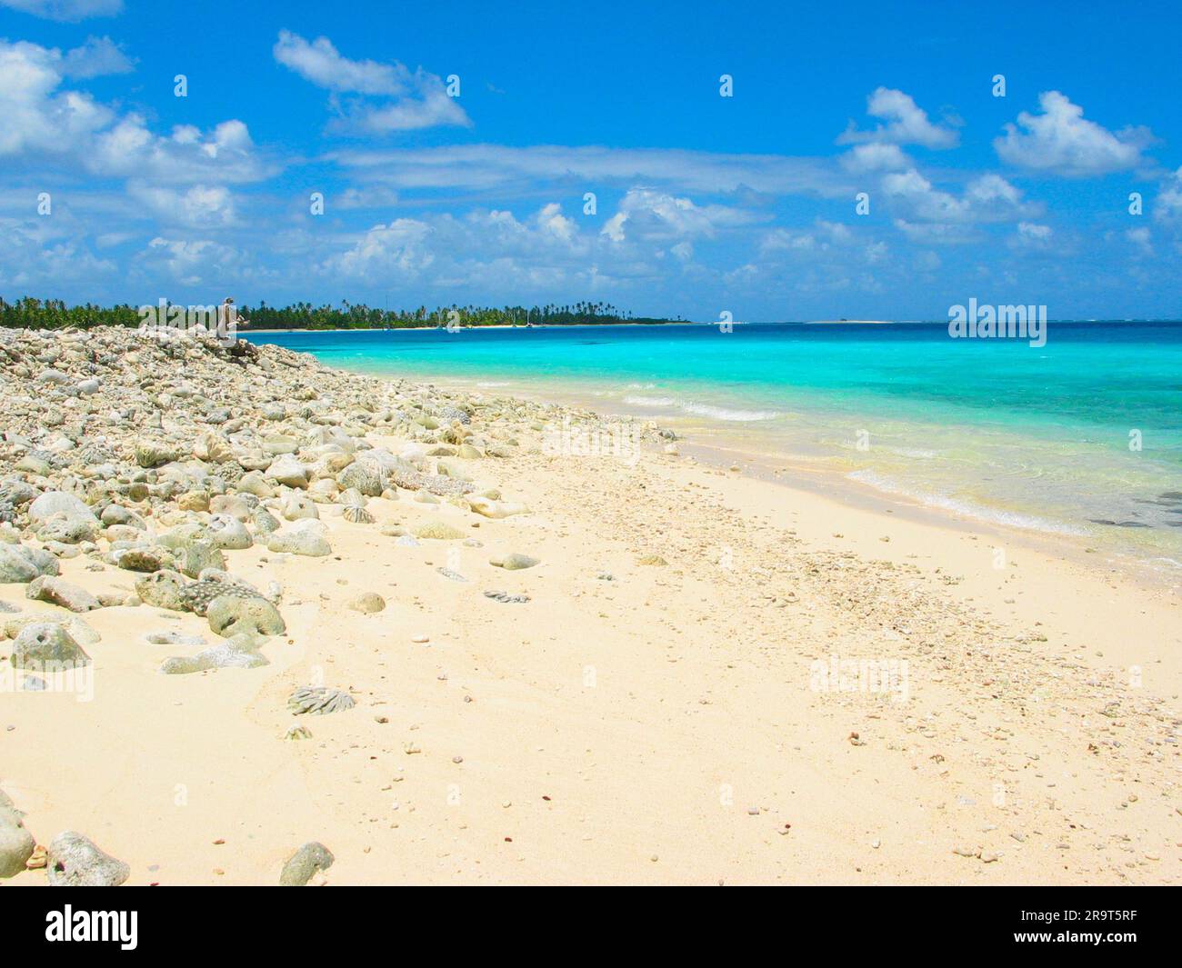 Coral beach, anchorage and cruising sailboats at Cocos Keeling Islands, Indian Ocean, Australia. Stock Photo