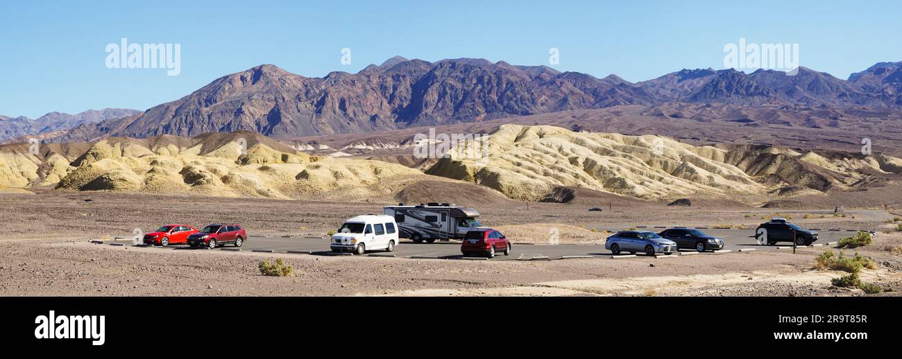 Group of cars parked on desert, Death Valley National Park, California