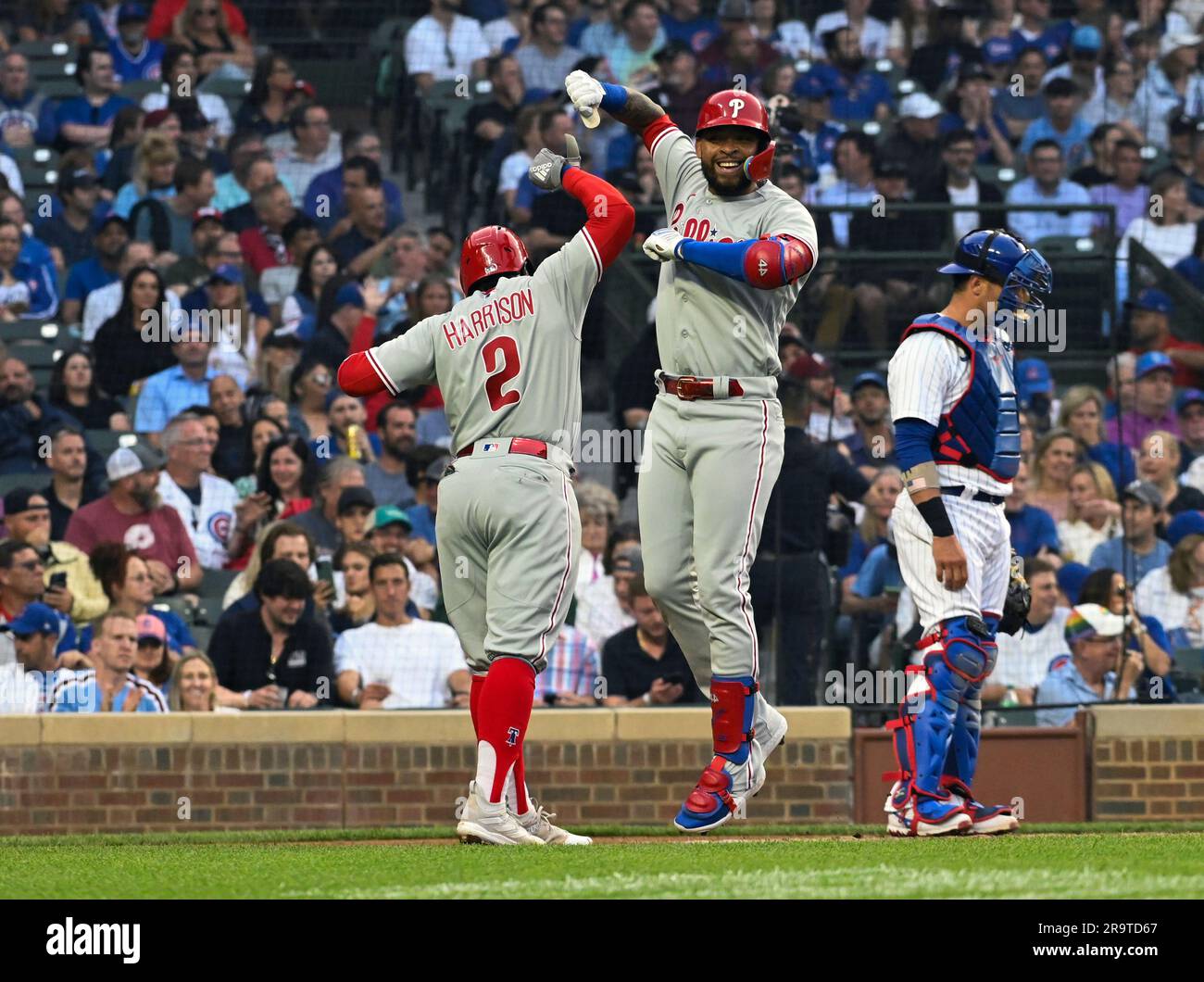 Philadelphia Phillies' Edmundo Sosa, right, scores as Houston Astros  catcher Martin Maldonado stands in front of home plate during the seventh  inning of a baseball game Friday, April 28, 2023, in Houston. (