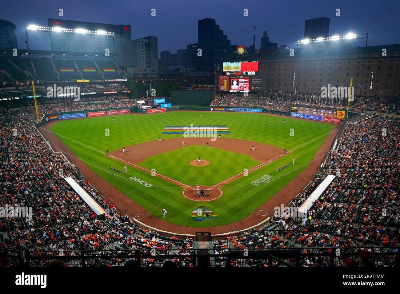 A crowd watches the fifth inning of a baseball game between the Baltimore  Orioles and the Cincinnati Reds during Pride Night, Wednesday, June 28, 2023,  in Baltimore. (AP Photo/Julio Cortez Stock Photo 