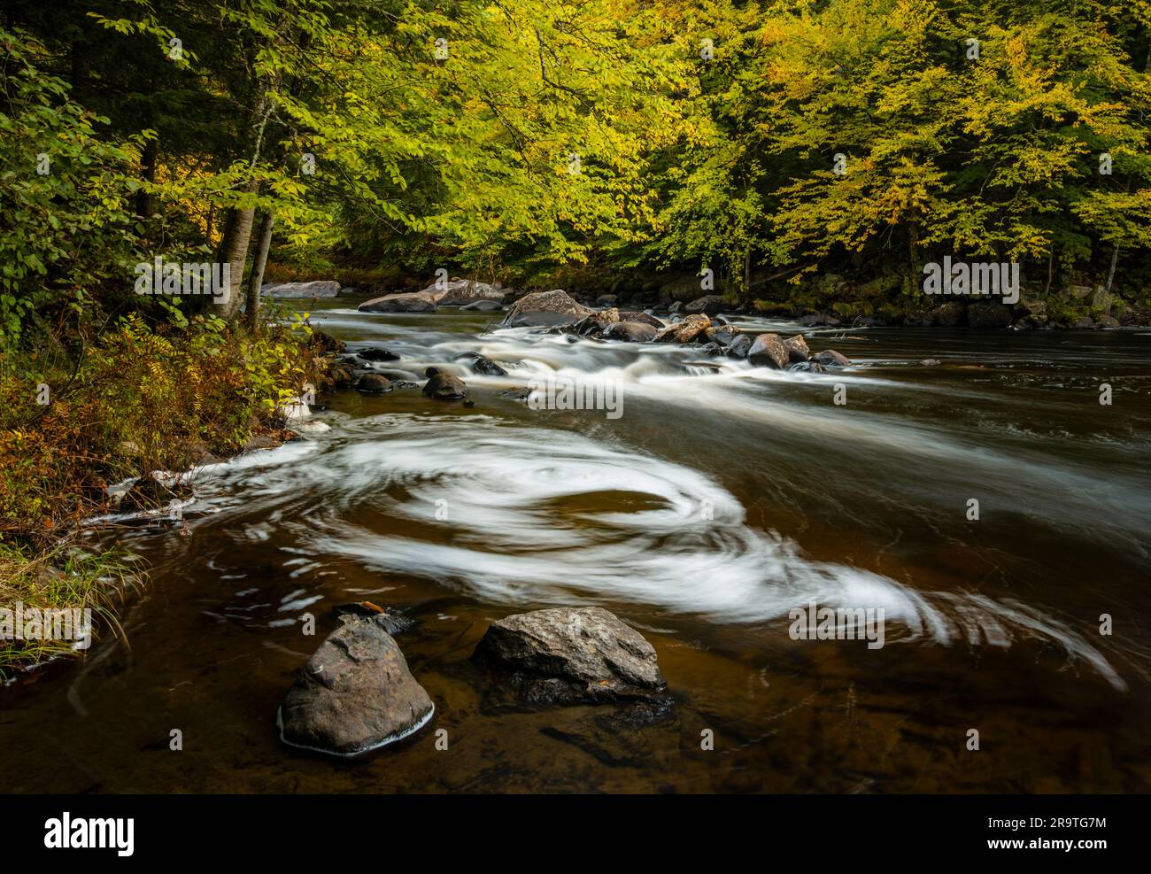 Whirlpool on Sacandaga River in autumn, Adirondack Mountains, New York, USA Stock Photo