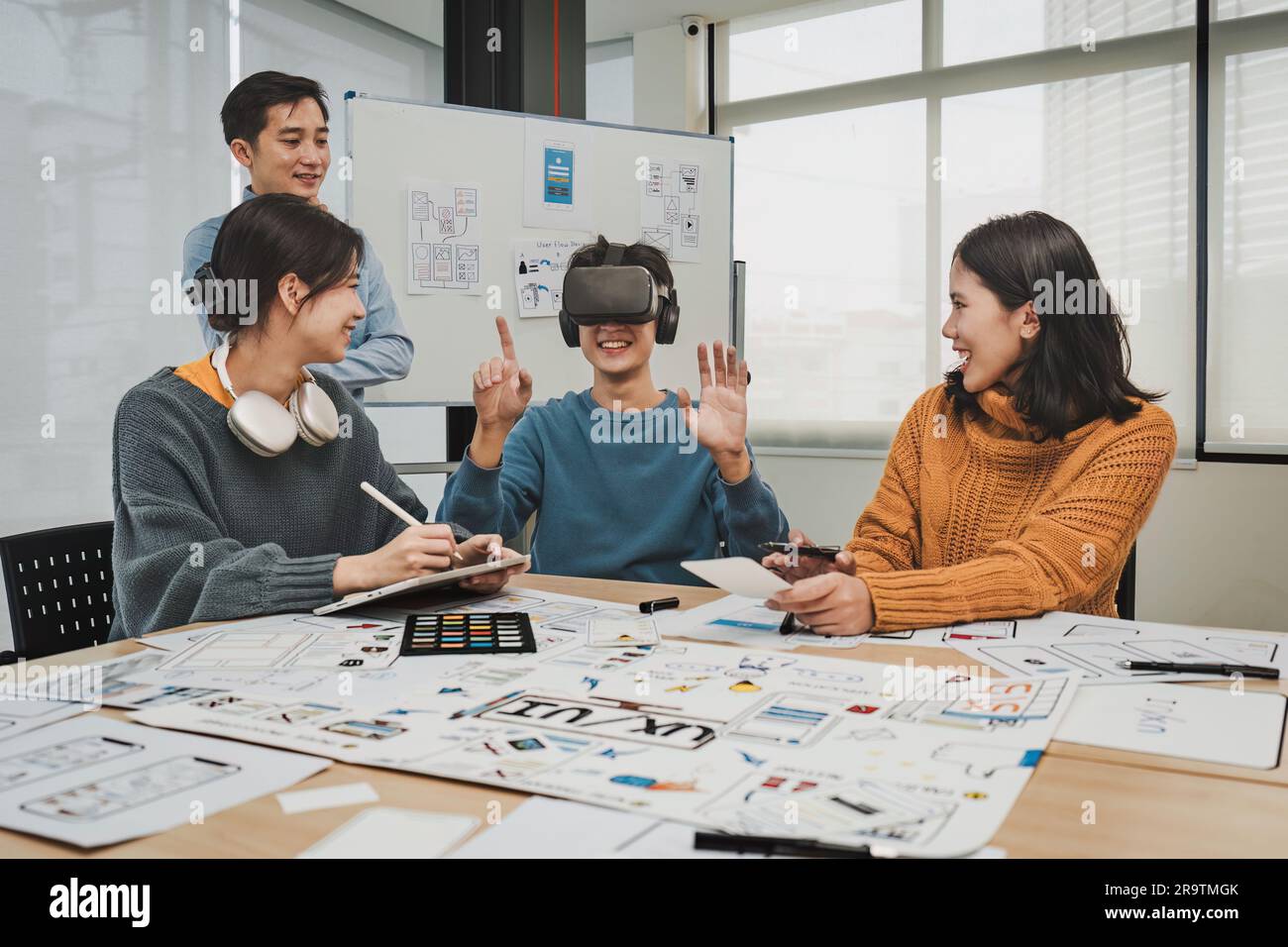 Team of ux developer and ui designer brainstorming interface wireframe ...