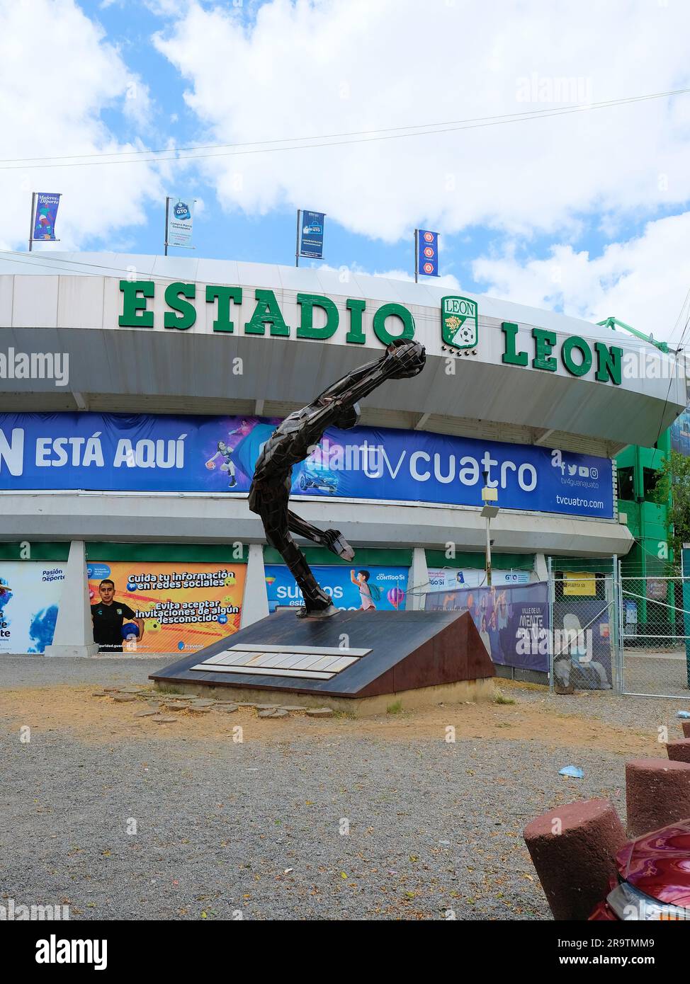 Estadio Leon soccer stadium with 'Arrojo' statue by Ricardo Motilla honoring football goalkeeper Antonio 'La Tota' Carbajal; Leon, Guanajuato, Mexico. Stock Photo