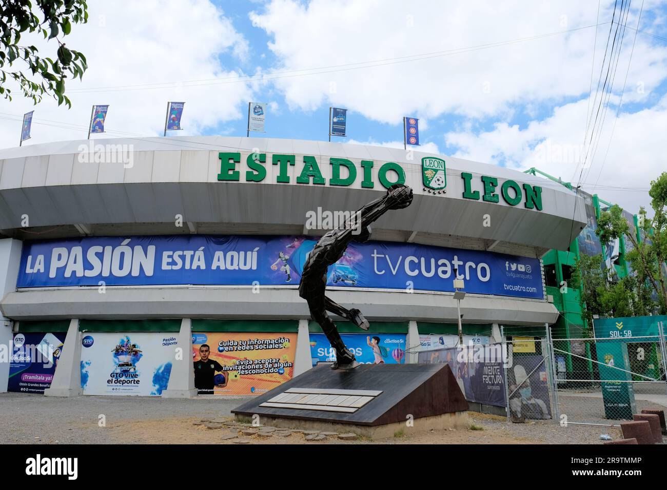 Estadio Leon soccer stadium with 'Arrojo' statue by Ricardo Motilla honoring football goalkeeper Antonio 'La Tota' Carbajal; Leon, Guanajuato, Mexico. Stock Photo