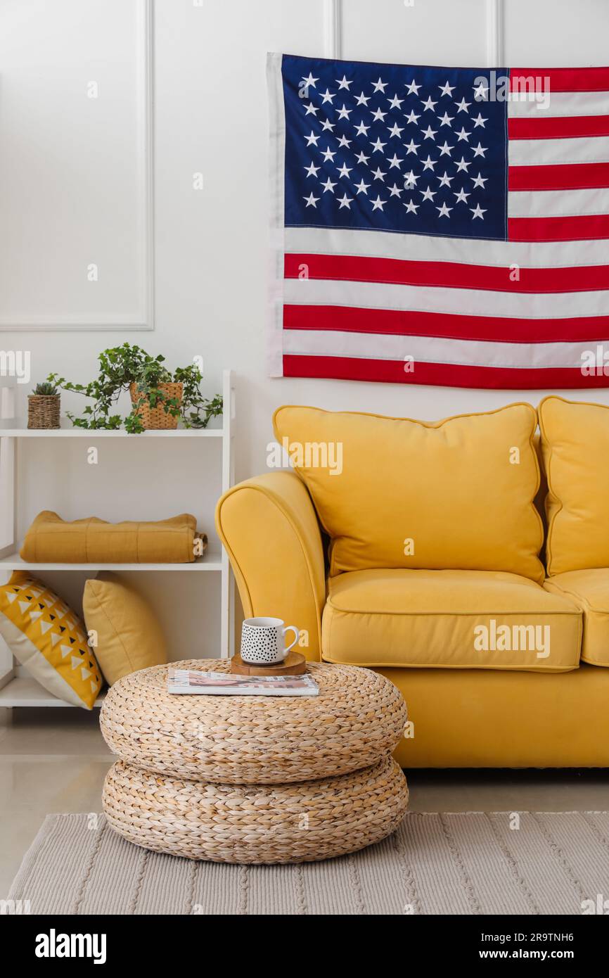 Interior of modern living room with hanging USA flag Stock Photo - Alamy