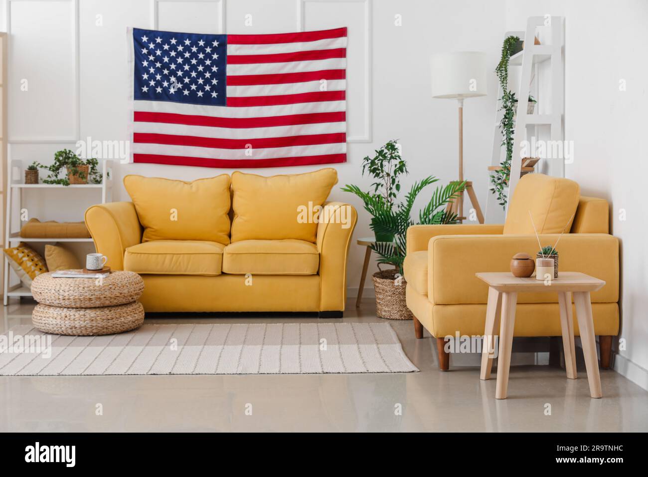 Interior of modern living room with hanging USA flag Stock Photo - Alamy