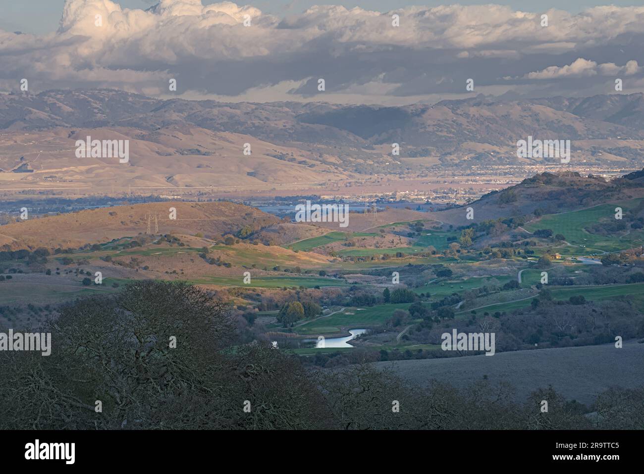 View of Silicon Valley under cloudy sky at sunset. Stock Photo