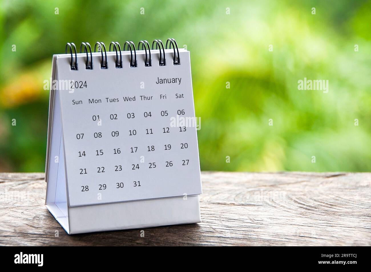 January 2024 table calendar with customizable space for text. Calendar