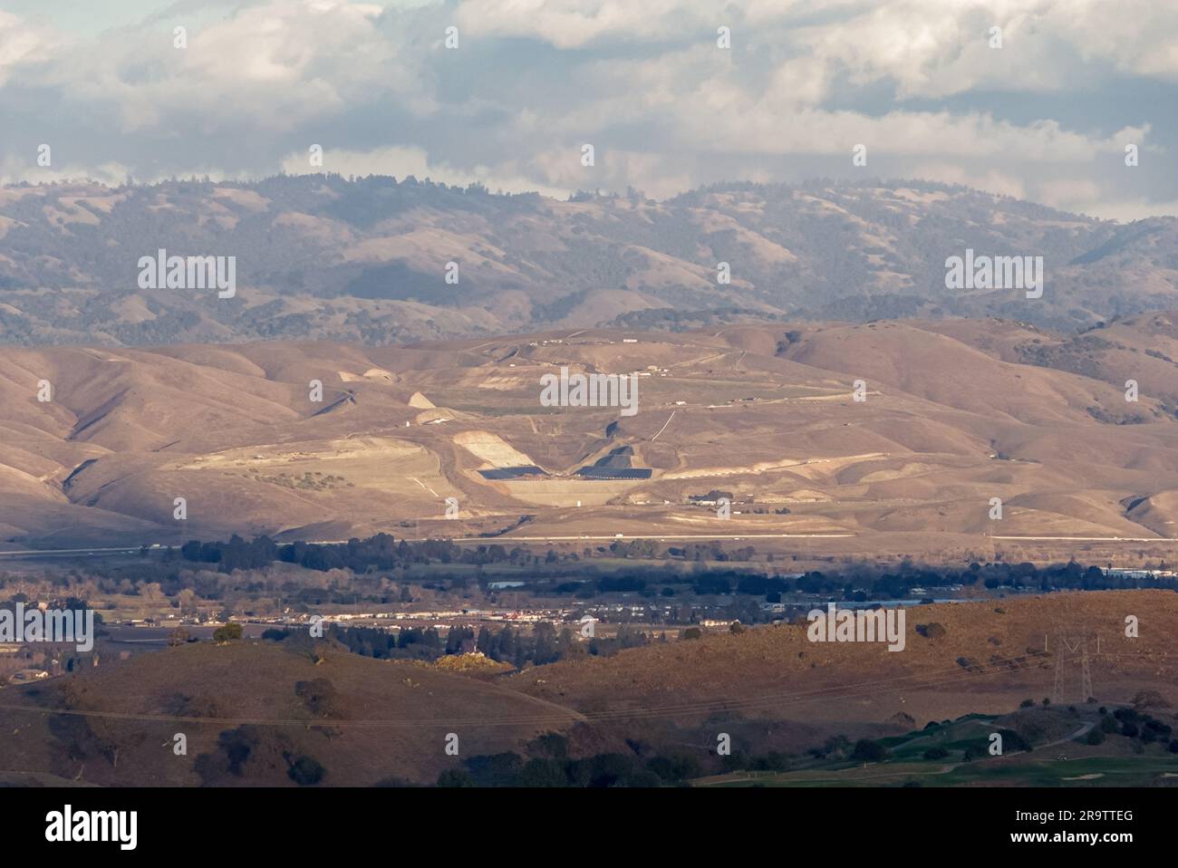 View of Silicon Valley under cloudy sky at sunset. Stock Photo